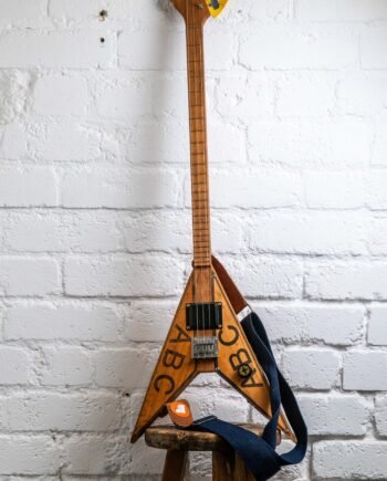 Flying V three strings guitar